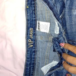 Distressed ripped jeans